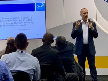 Spencer presenting at an OMAC session on the economic value of interoperability.